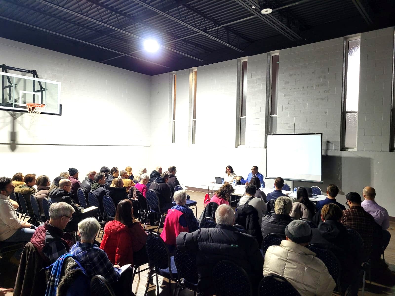 Hearing directly from residents at a 910 Pharmacy Avenue community meeting.